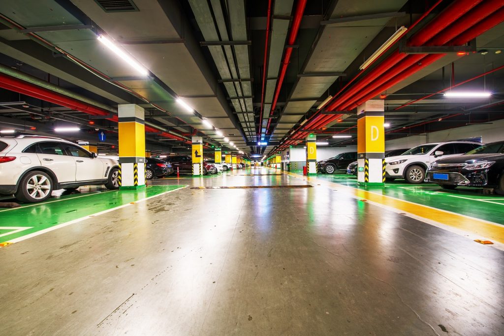 An underground parking lot with parking systems