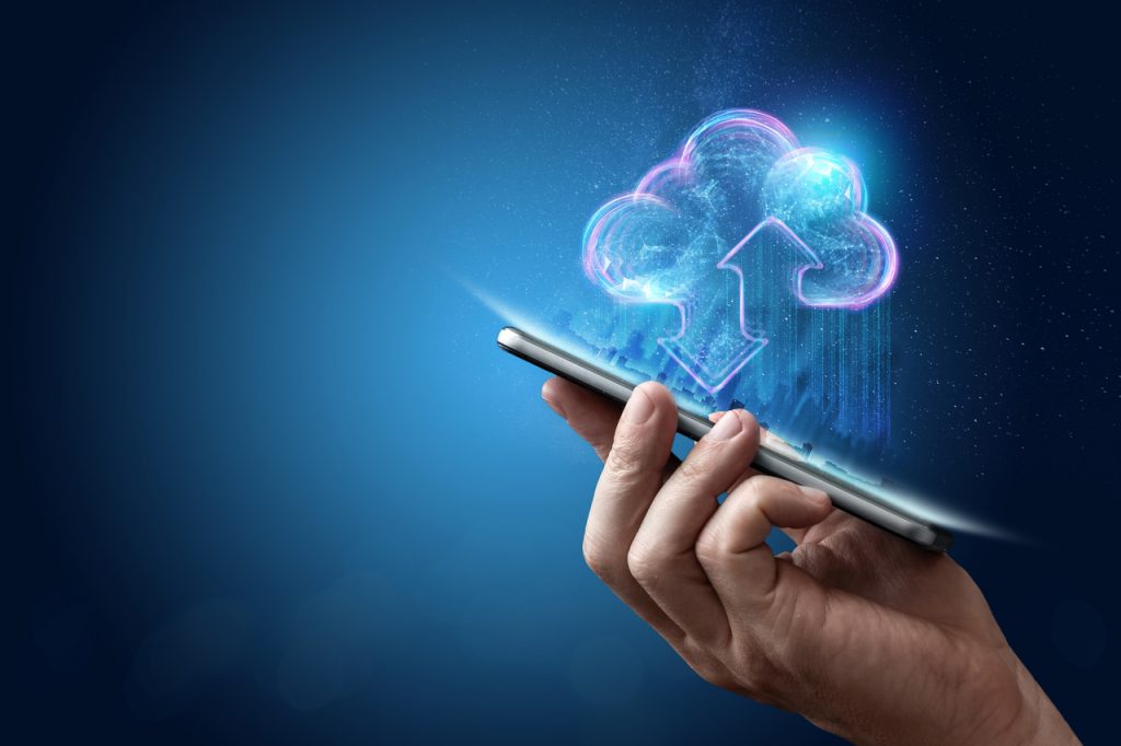 Graphics of a person accessing cloud data through a cellphone