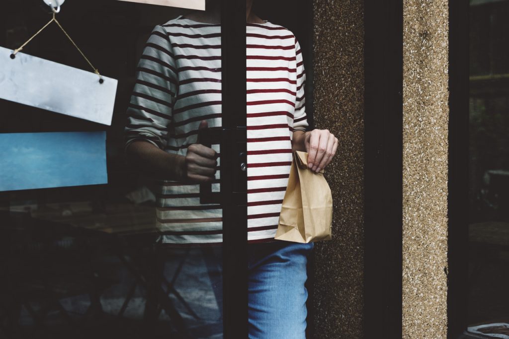 An employee exiting her office