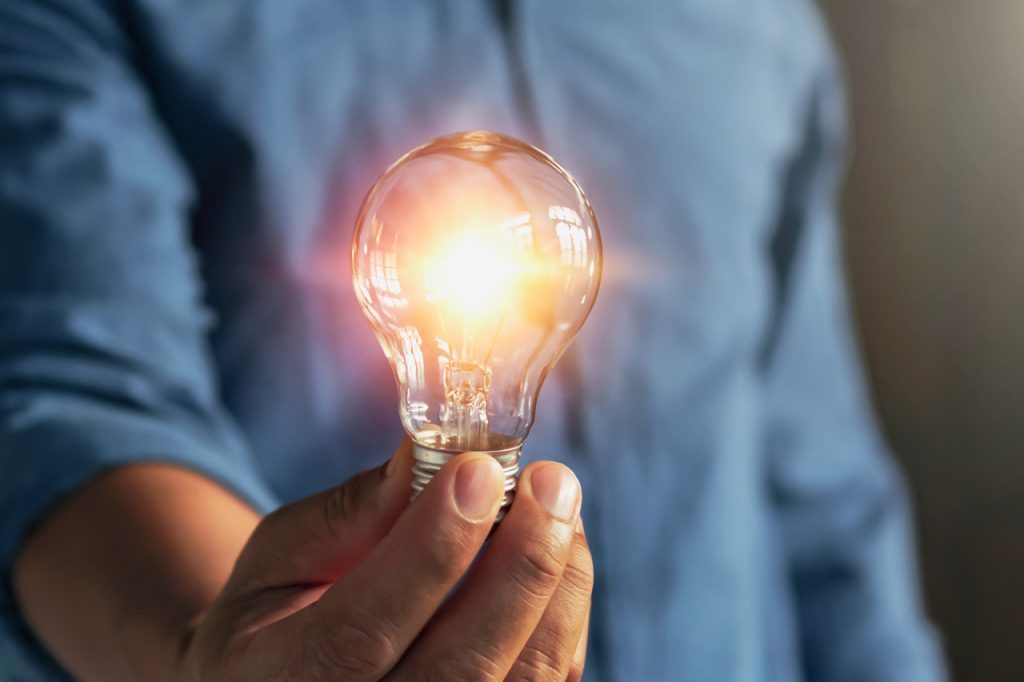 A man holding smart lighting